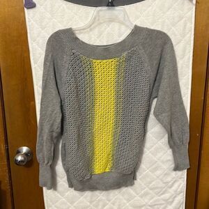Gray and yellow sweater with pockets